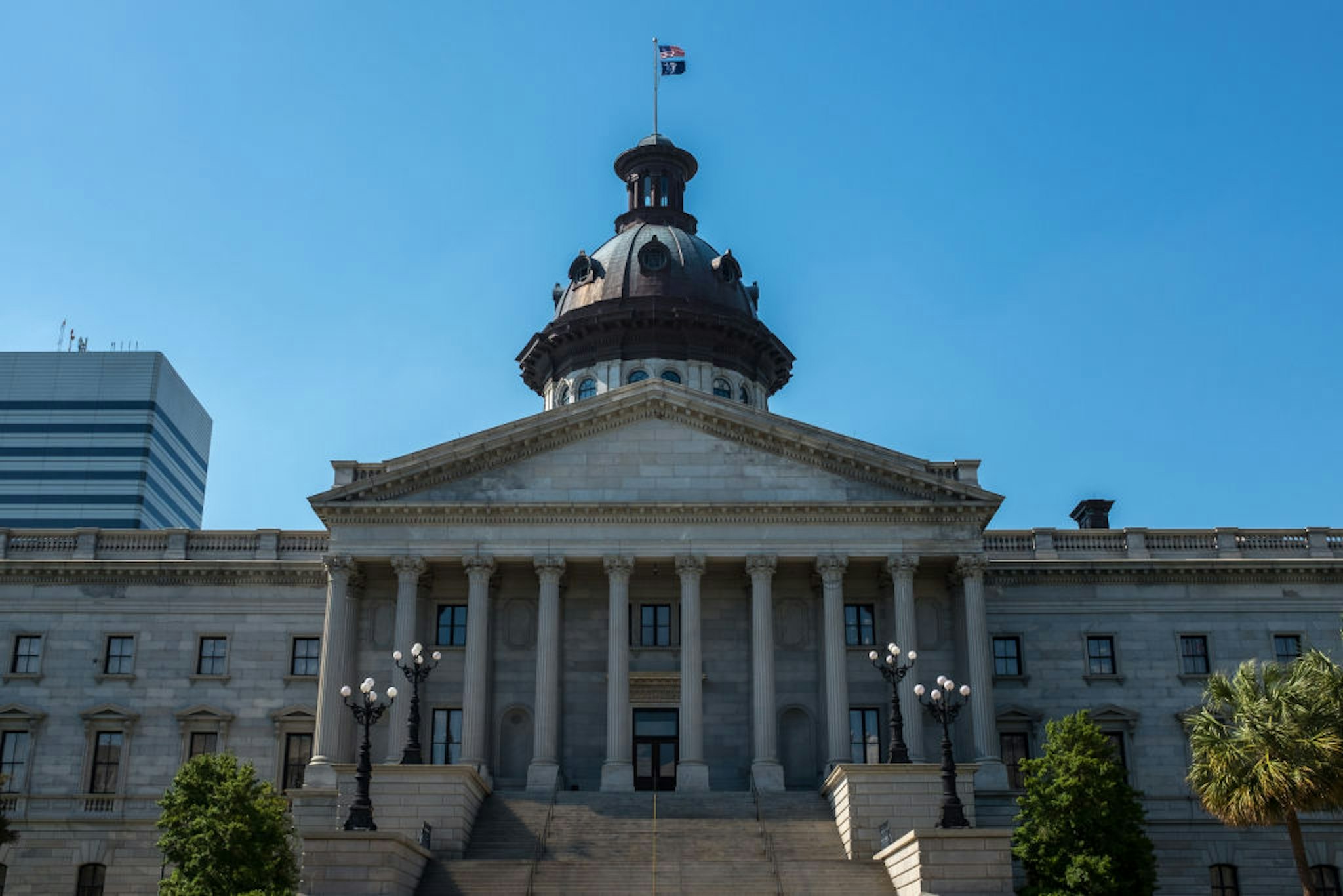 An exterior view of the South Carolina State House, Columbia - construction work first began in 1851 and was completed in 1907, it was designated a national historic landmark in 1976 for its significance in the post-civil war reconstruction era.