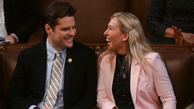Rep.-elect Matt Gaetz, (R-Fla.) speaks with Rep.-elect Marjorie Taylor Greene (R-Ga.) as the House meets for a third day of voting and convenes the 118th Congress, Thursday, January 5, 2023, at the U.S. Capitol in Washington DC. (Photo by Matt McClain/The Washington Post via Getty Images)