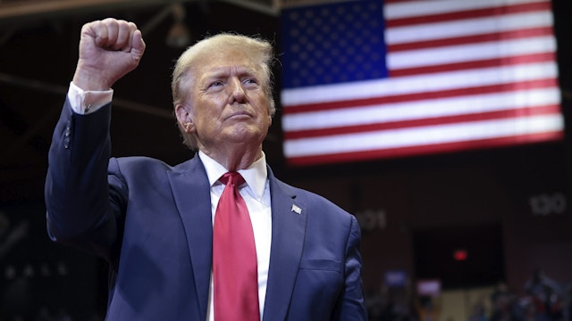 ROCK HILL, SOUTH CAROLINA - FEBRUARY 23: Republican presidential candidate and former President Donald Trump gestures to supporters after speaking at a Get Out The Vote rally at Winthrop University on February 23, 2024 in Rock Hill, South Carolina. Former President Trump is campaigning in South Carolina ahead of the state's Republican presidential primary on February 24.