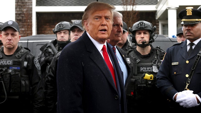 MASSAPEQUA, NEW YORK - MARCH 28: Former U.S. President Donald Trump speaks to the media after attending the wake of slain NYPD Officer Jonathan Diller at the Massapequa Funeral Home on March 28, 2024 in Massapequa, New York. Officer Diller was killed on March 25th when he was shot in Queens after approaching an illegally parked vehicle. Two suspects have been arrested and charged, and are being held without bail for the killing. Trump met with the officers family members, local police officers and other officials.