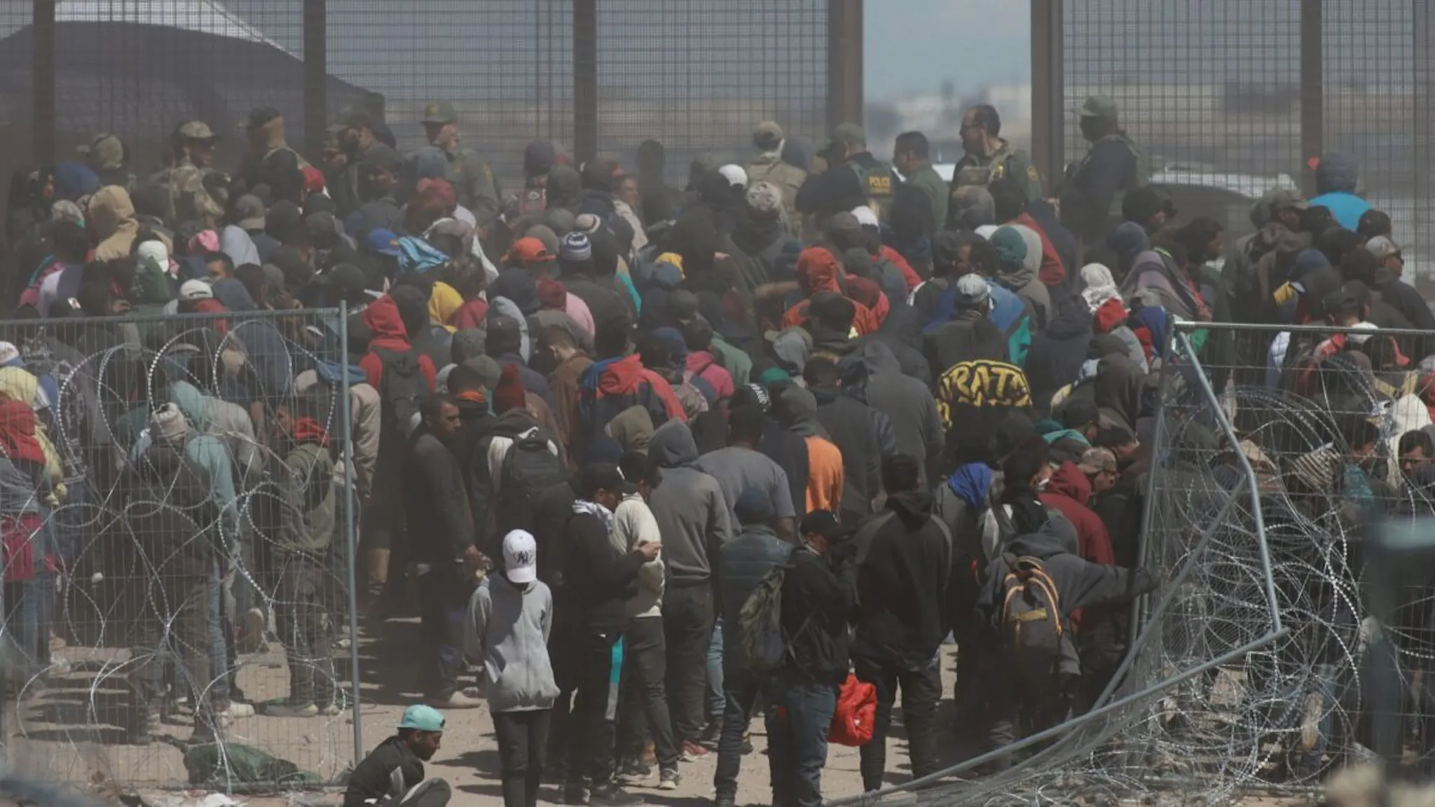 Migrants Rushing Border CIUDAD JUAREZ , MEXICO - MARCH 21: Hundreds of foreigners who camped at the border, broke the fence with their hands, sticks and different tools they had, placed blankets over the spikes and entered the United States, through the area known as Gate 36 in Ciudad Juarez, Mexico on March 21, 2024.