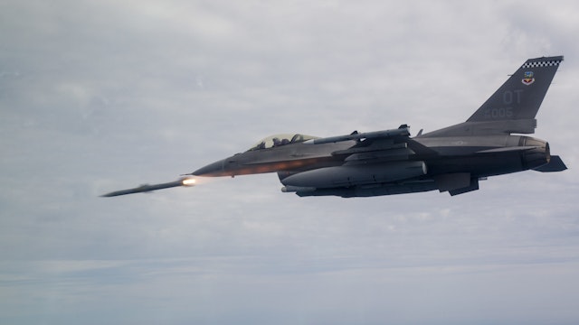 An F-16C Fighting Falcon assigned to the 85th Test Evaluation Squadron shoots an AIM-120 Advanced Medium-Range Air-to-Air Missile, or AMRAAM over testing ranges near Eglin Air Force Base, Fla., March 19, 2019. The AMRAAM is a modern beyond-visual-range air-to-air missile capable of all-weather day-and-night operations