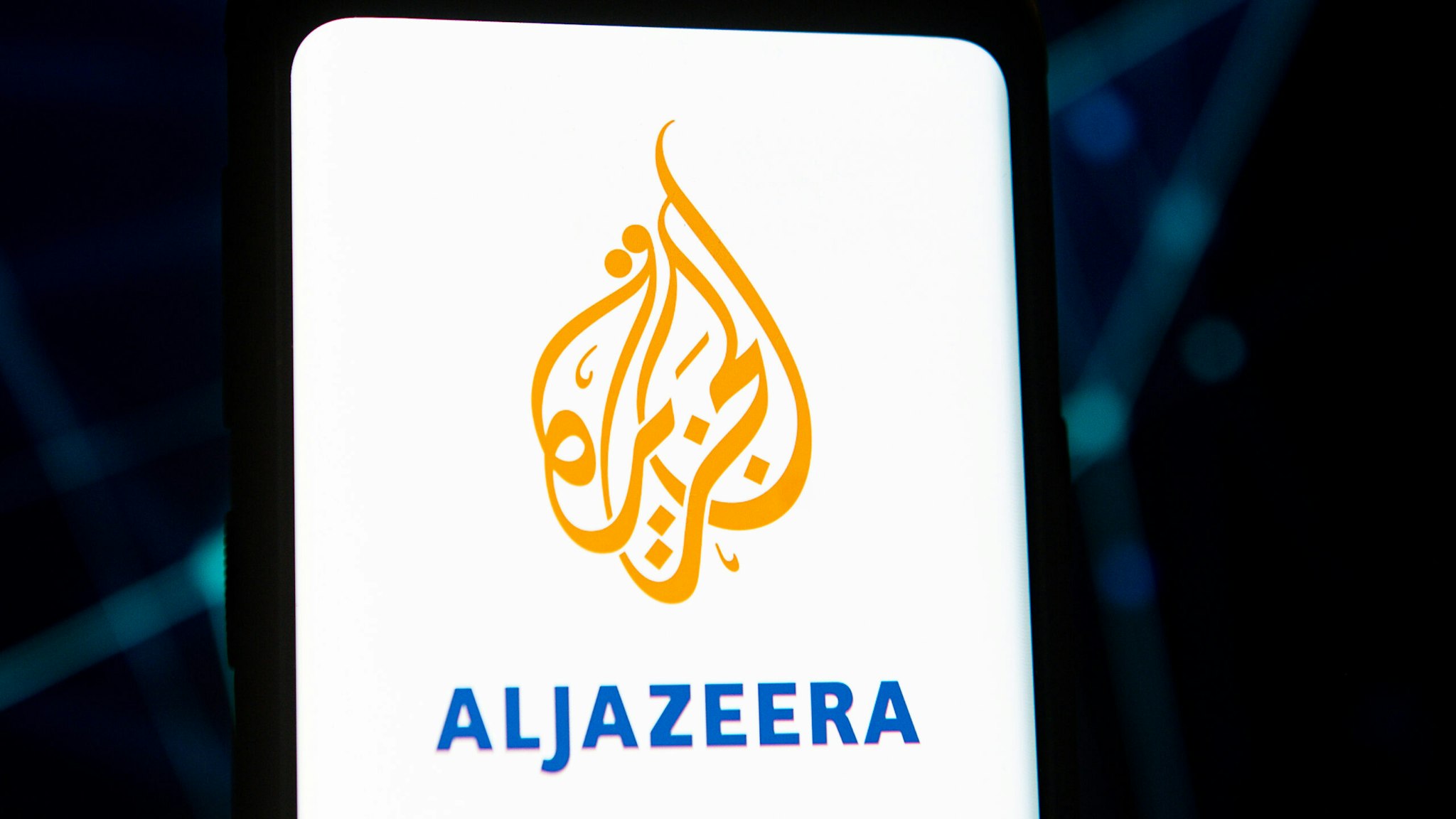 POLAND - 2020/03/23: In this photo illustration an Aljazeera logo seen displayed on a smartphone.