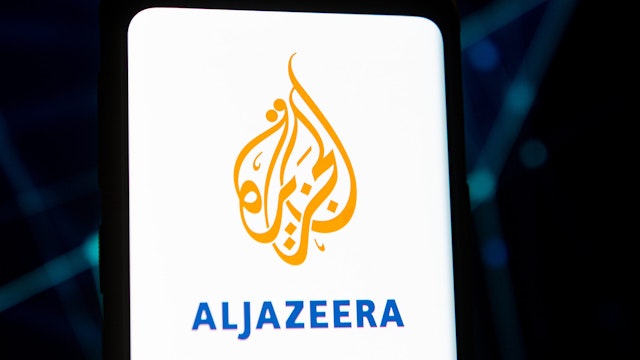 POLAND - 2020/03/23: In this photo illustration an Aljazeera logo seen displayed on a smartphone.