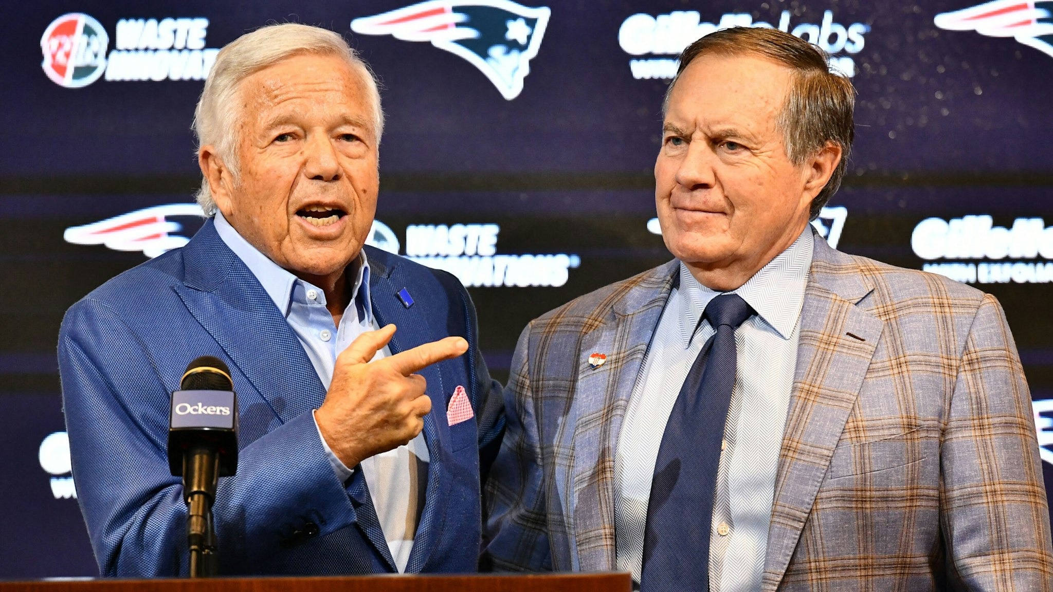 New England Patriots head coach Bill Belichick (R) and Patriots owner Robert Kraft speak to reporters where Belichick announced he is leaving the team during a press conference at Gillette Stadium in Foxborough, Massachusetts, on January 11, 2024. Belichick, the NFL mastermind who has guided the New England Patriots to a record six Super Bowl titles as head coach, is parting ways with the team after 24 seasons.