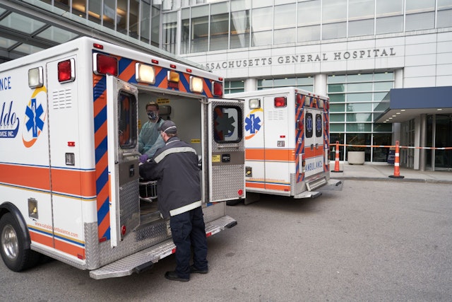CHELSEA, UNITED STATES - APRIL 23: A Cataldo EMS team transports a suspected Covid-19 patient from Chelsea to Massachusetts General Hospital on April 23, 2020 in Boston, Massachusetts United States. EMTs and Paramedics for Cataldo Ambulance work during the surge of Covid-19 cases transporting suspected Covid-19 patients and other patients. (Photo by David Degner/Getty Images).