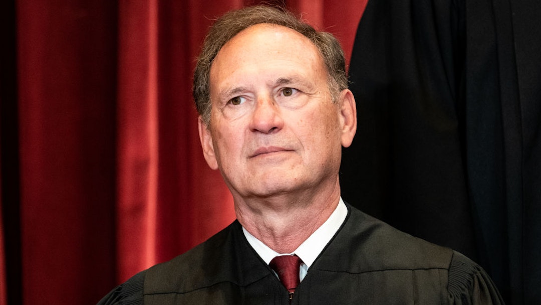 WASHINGTON, DC - APRIL 23: Associate Justice Samuel Alito sits during a group photo of the Justices at the Supreme Court in Washington, DC on April 23, 2021. (Photo by Erin Schaff-Pool/Getty Images)
