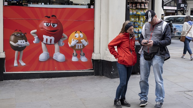 Mars Inc., the company behind M&Ms, is a key member of a group of advertisers seeking to withhold ads from disfavored news outlets.(photo by Mike Kemp/In Pictures via Getty Images)