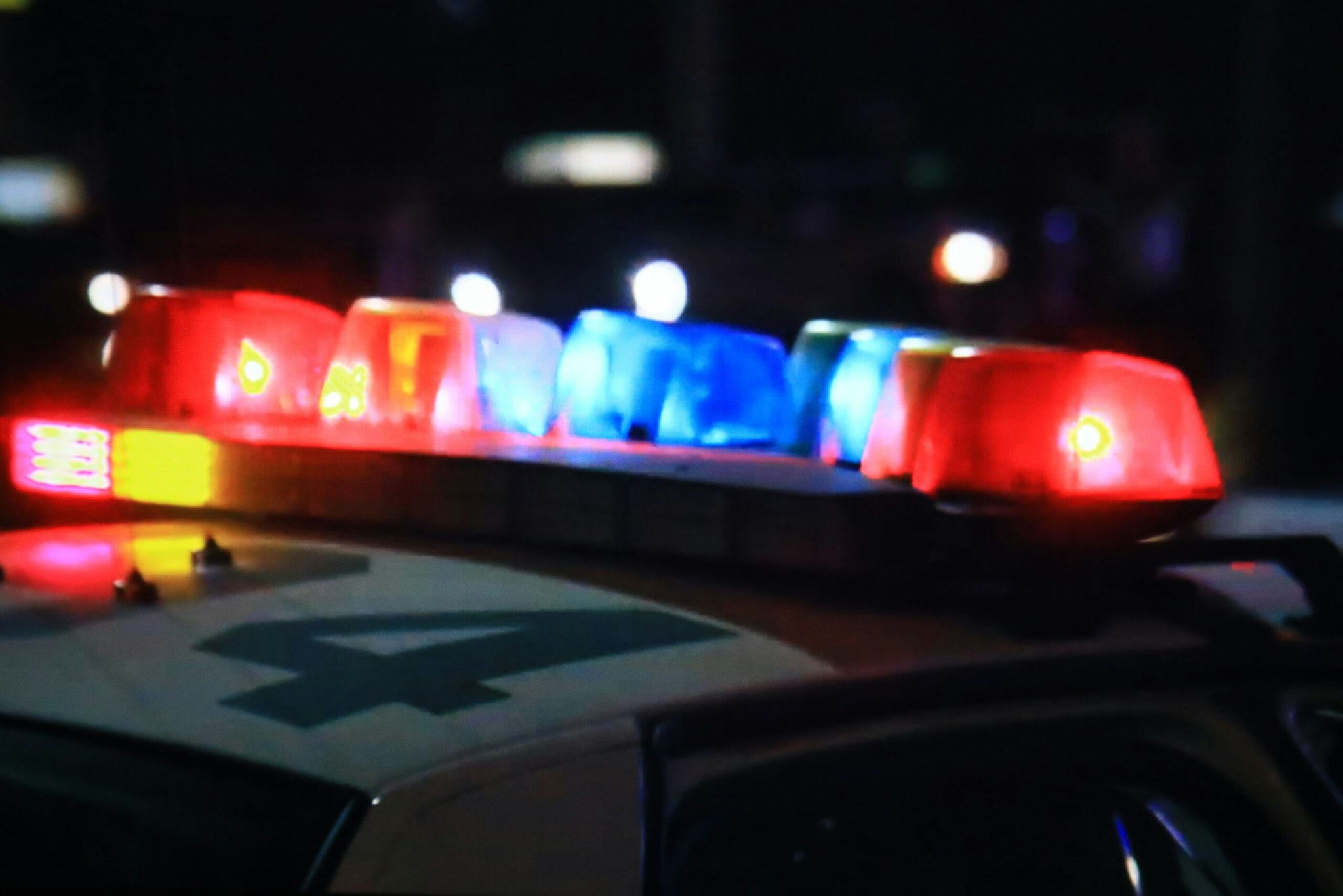 Flashing lights on a police car - stock photo