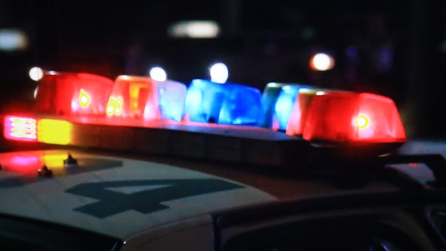 Flashing lights on a police car - stock photo