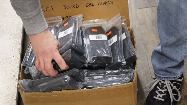TINLEY PARK, ILLINOIS - JANUARY 11: High capacity rifle magazines are removed from display at Freddie Bear Sports on January 11, 2023 in Tinley Park, Illinois. Yesterday evening, Illinois Governor J.B. Pritzker signed legislation banning the sale of rifle magazines capable of holding more than 10 rounds and pistol magazines capable of holding more than 15 rounds as well as several guns classified as assault weapons. The Illinois State Rifle Association, citing 2.5 million gun owners in the state, has vowed to fight the legislation in court. Eight other states and Washington D.C. have enacted similar bans.