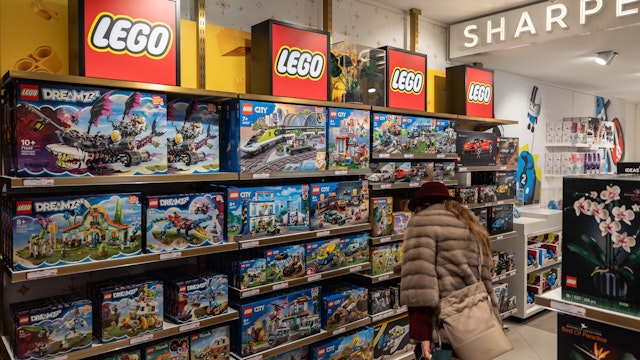 A woman looks at some LEGO sets as she visits the American toy brand Fao Schwarz flagship store on December 05, 2023 in Milan, Italy.