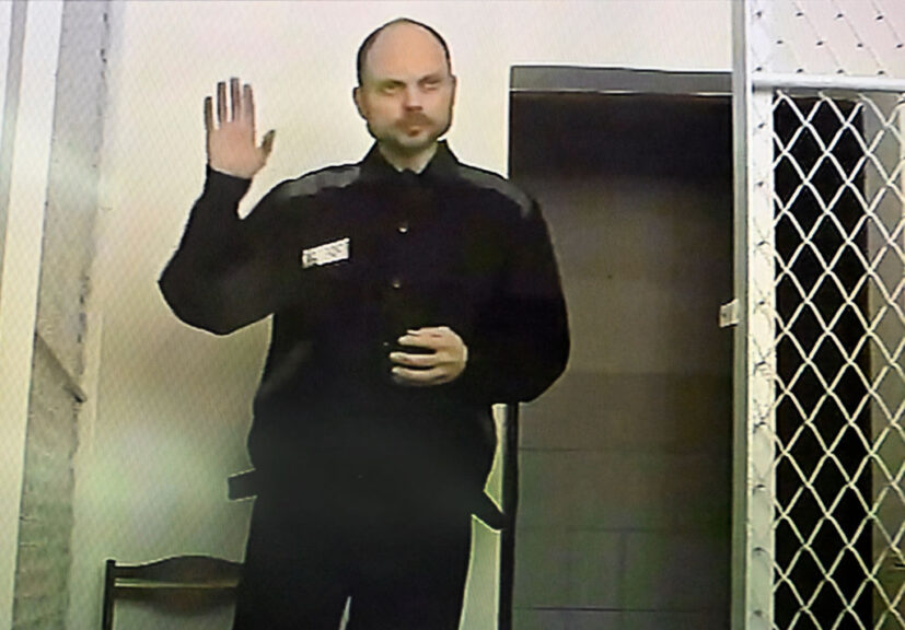 Jailed Russian opposition figure and journalist Vladimir Kara-Murza, who is serving a 25-year sentence over charges including treason over criticism of the Ukraine offensive, appears in court with a video link from his prison for a hearing in the case against inaction of the Investigative Committee of Russia on his poisoning, in Moscow on February 22, 2024. (Photo by Alexander NEMENOV / AFP) (Photo by ALEXANDER NEMENOV/AFP via Getty Images)