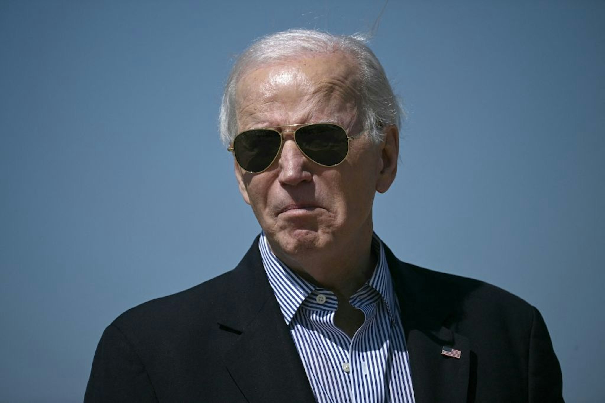 US President Joe Biden walks to board Air Force One at Joint Base Andrews, Maryland, on March 29, 2024. Biden is heading to Camp David, the presidential retreat in Maryland, to spend the Easter weekend.