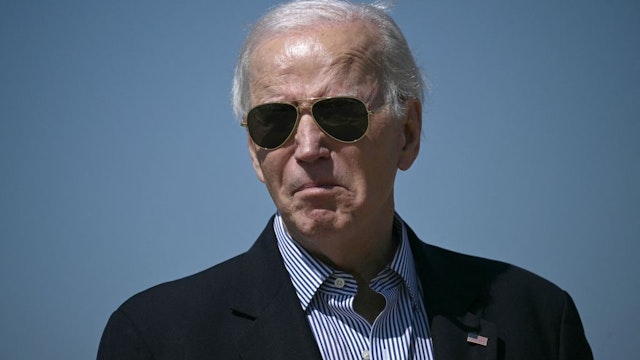 US President Joe Biden walks to board Air Force One at Joint Base Andrews, Maryland, on March 29, 2024. Biden is heading to Camp David, the presidential retreat in Maryland, to spend the Easter weekend.