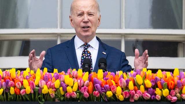 US President Joe Biden speaks from the balcony of the White House during the annual Easter Egg Roll on the South Lawn in Washington, DC, on April 1, 2024. (Photo by Jim WATSON / AFP) (Photo by JIM WATSON/AFP via Getty Images)