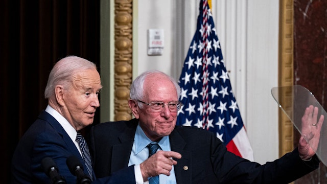 US President Joe Biden, left, and Senator Bernie Sanders, an Independent from Vermont, in the Indian Treaty Room of the White House in Washington, DC, US, on Wednesday, April 3, 2024. The Biden administration wants to tackle rampant shortages of drugs for cancer and other diseases with a multibillion-dollar plan that calls for hospitals to pay more for reliable supplies of high-quality medicines. Photographer: Al Drago/Bloomberg via Getty Images