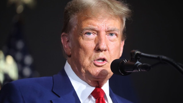GRAND RAPIDS, MICHIGAN - APRIL 02: Former U.S. President Donald Trump speaks at a campaign event on April 02, 2024 in Grand Rapids, Michigan. Trump delivered a speech which his campaign has called "Biden's Border Bloodbath", as recent polls have shown that immigration and the situation at the U.S. Southern border continue to be top issues on voters' minds going into the November election.
