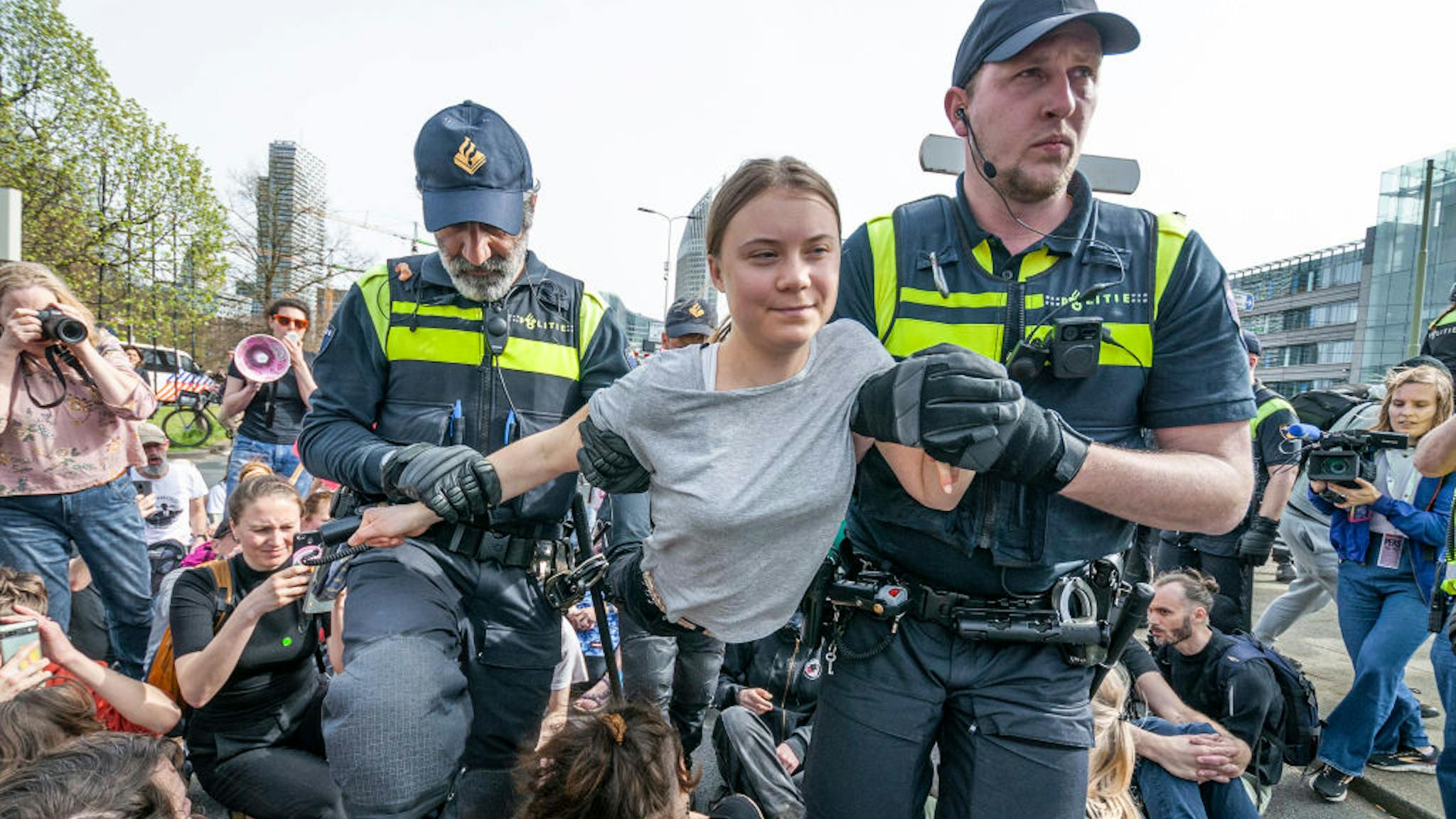Swedish climate Greta Thunberg on her second arrest during KONINGSKADE, THE HAGUE, NETHERLANDS - 2024/04/06: Swedish climate Greta Thunberg on her second arrest during today's failed A12 Blockade in The Hague.
