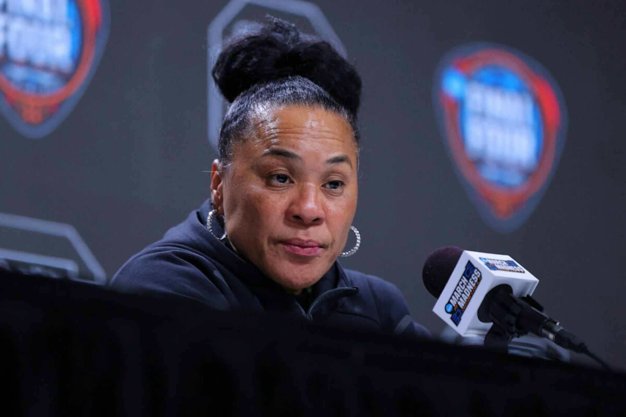 CLEVELAND, OHIO - APRIL 05: Head coach Dawn Staley of the South Carolina Gamecocks speaks with the media after beating the NC State Wolfpack 78-59 the NCAA Women's Basketball Tournament Final Four semifinal game at Rocket Mortgage Fieldhouse on April 05, 2024 in Cleveland, Ohio.