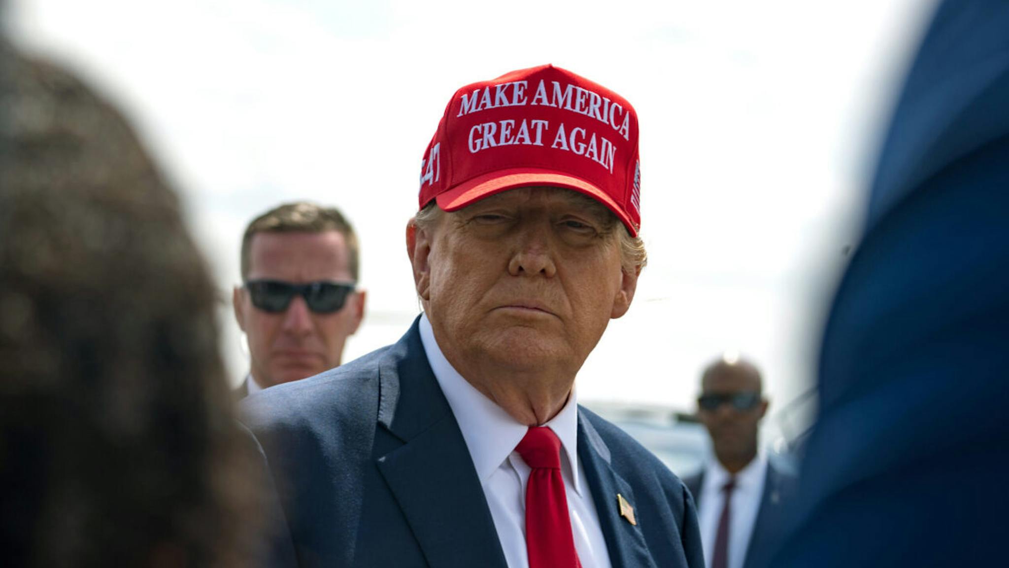 Donald Trump ATLANTA, GEORGIA - APRIL 10: Former U.S. President Donald Trump speaks to the media as he arrives at the Atlanta Airport on April 10, 2024 in Atlanta, Georgia. Trump is visiting Atlanta for a campaign fundraising event he is hosting.