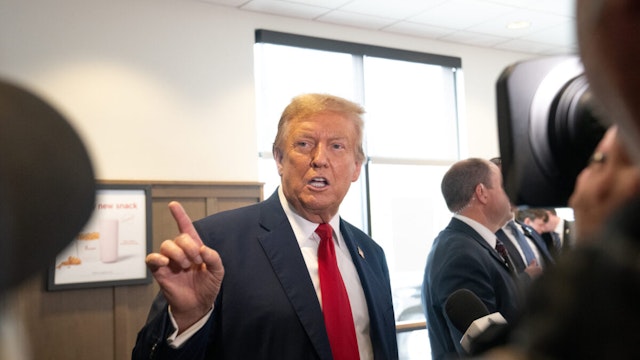 Former U.S. President Donald Trump speaks to the media during a visit to a Chick-fil-A restaurant on April 10, 2024 in Atlanta, Georgia. Trump is visiting Atlanta for a campaign fundraising event he is hosting.