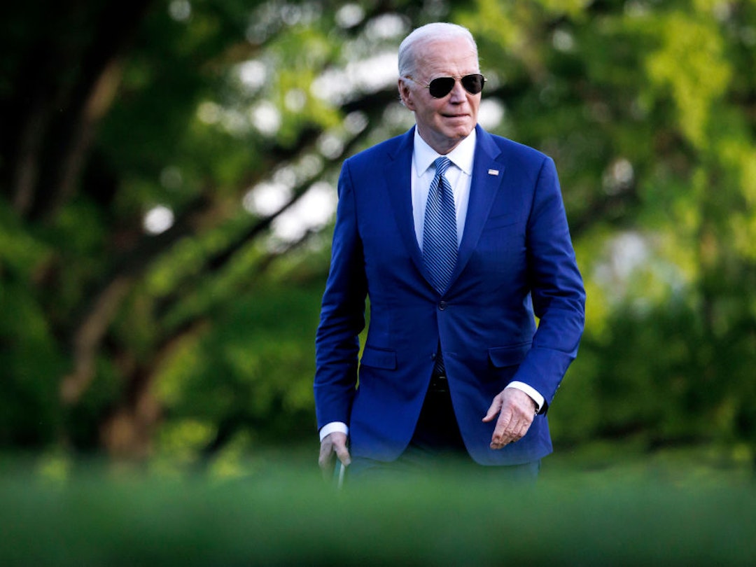 US President Joe Biden walks on the South Lawn of the White House after arriving on Marine One in Washington, DC, US, on Tuesday, April 23, 2024. The White House is set to announce $1 billion in fresh military aid for Ukraine including 155mm artillery shells and air-defense munitions, two administration officials said, as the US looks to act quickly once a long-delayed supplemental funding request becomes law. Photographer: Ting Shen/Bloomberg via Getty Images