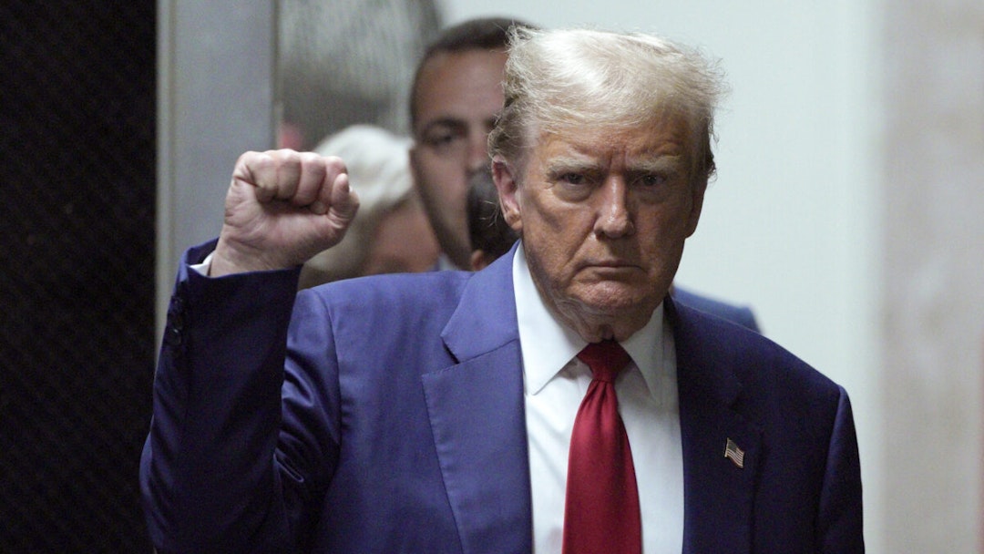 NEW YORK, NEW YORK - APRIL 30: Former U.S. President Donald Trump gestures as he returns to court during his trial for allegedly covering up hush money payments at Manhattan Criminal Court on April 30, 2024 in New York City. Former U.S. President Donald Trump faces 34 felony counts of falsifying business records in the first of his criminal cases to go to trial.