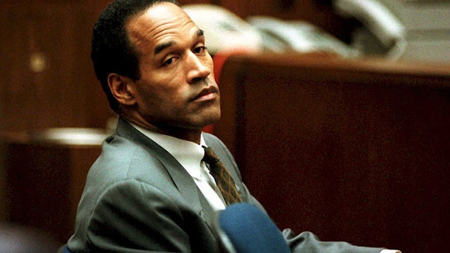 LOS ANGELES, CA - DECEMBER 8: O. J. Simpson sits in Superior Court in Los Angeles 08 December 1994 during an open court session where Judge Lance Ito denied a media attorney's request to open court transcripts from a 07 December private meeting involving prospective jurors. Final selection of alternate jurors by attorneys in the double murder case is expected later this afternoon. (Photo credit should read POOL/AFP via Getty Images)