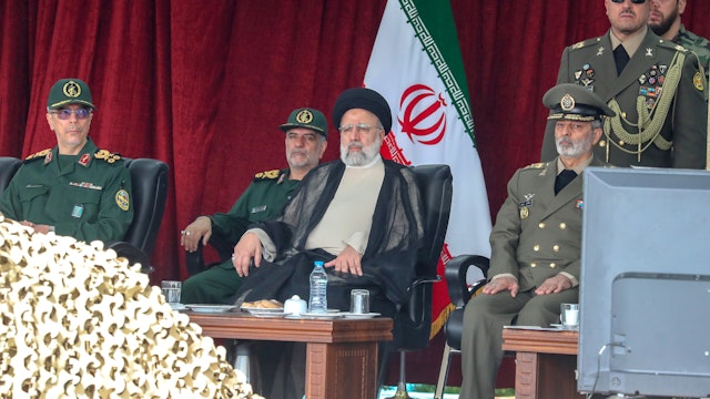 TEHRAN, IRAN - APRIL 17: Iran's President Ebrahim Raisi attends a military parade alongside high-ranking officials and commanders during a ceremony marking the country's annual army day on April 17, 2024. in Tehran, Iran. The Islamic Republic of Iran Army Day is celebrated annually on April 17.