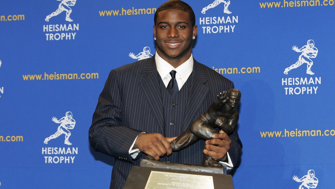 Reggie Bush, University of Southern California tailback holds the Heisman Trophy during the 2005 Heisman Trophy presentation at the Hard Rock Cafe in New York City, New York on December 10, 2005. Bush received 2,541 points in the ballot.