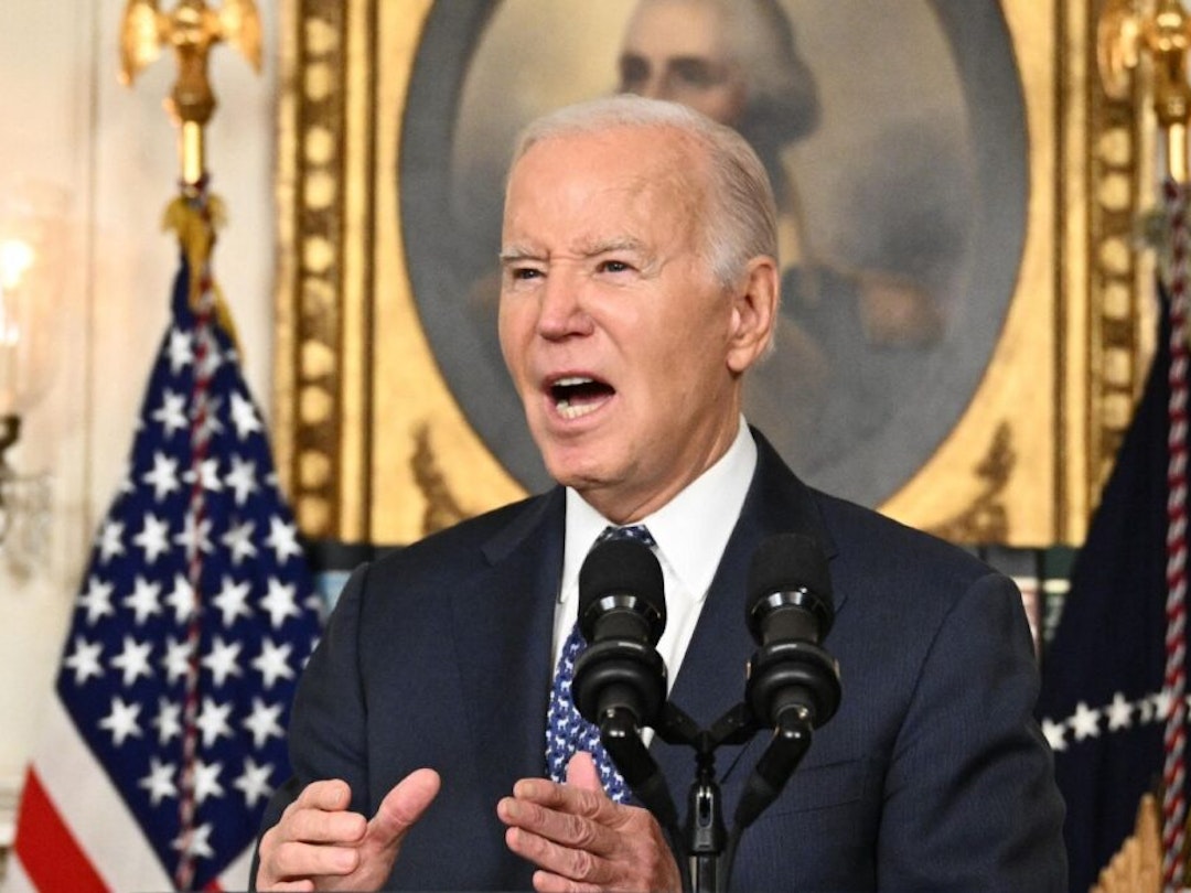 TOPSHOT - US President Joe Biden answers questions about Israel after speaking about the Special Counsel report in the Diplomatic Reception Room of the White House in Washington, DC, on February 8, 2024 in a surprise last-minute addition to his schedule for the day.