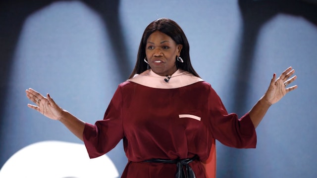 In this image released on December 2nd, Dame Vivian Hunt speaks on stage during BoF VOICES 2021 at Soho Farmhouse on December 01, 2021 in Oxfordshire, England. (Photo by John Phillips/Getty Images for BoF VOICES)