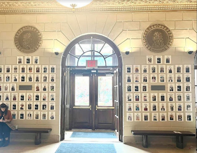 Columbia Journalism School wall of photos. X account holder: 'Professor Thacker'.