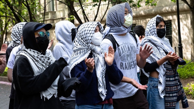 NEW YORK, NEW YORK - APRIL 30: Student Pro-Palestinian protestors chant near an entrance to Columbia University on April 30, 2024 in New York City. (Photo by Michael M. Santiago/Getty Images)