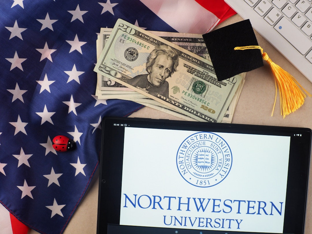 In this photo illustration, a Northwestern University logo seen displayed on a tablet.