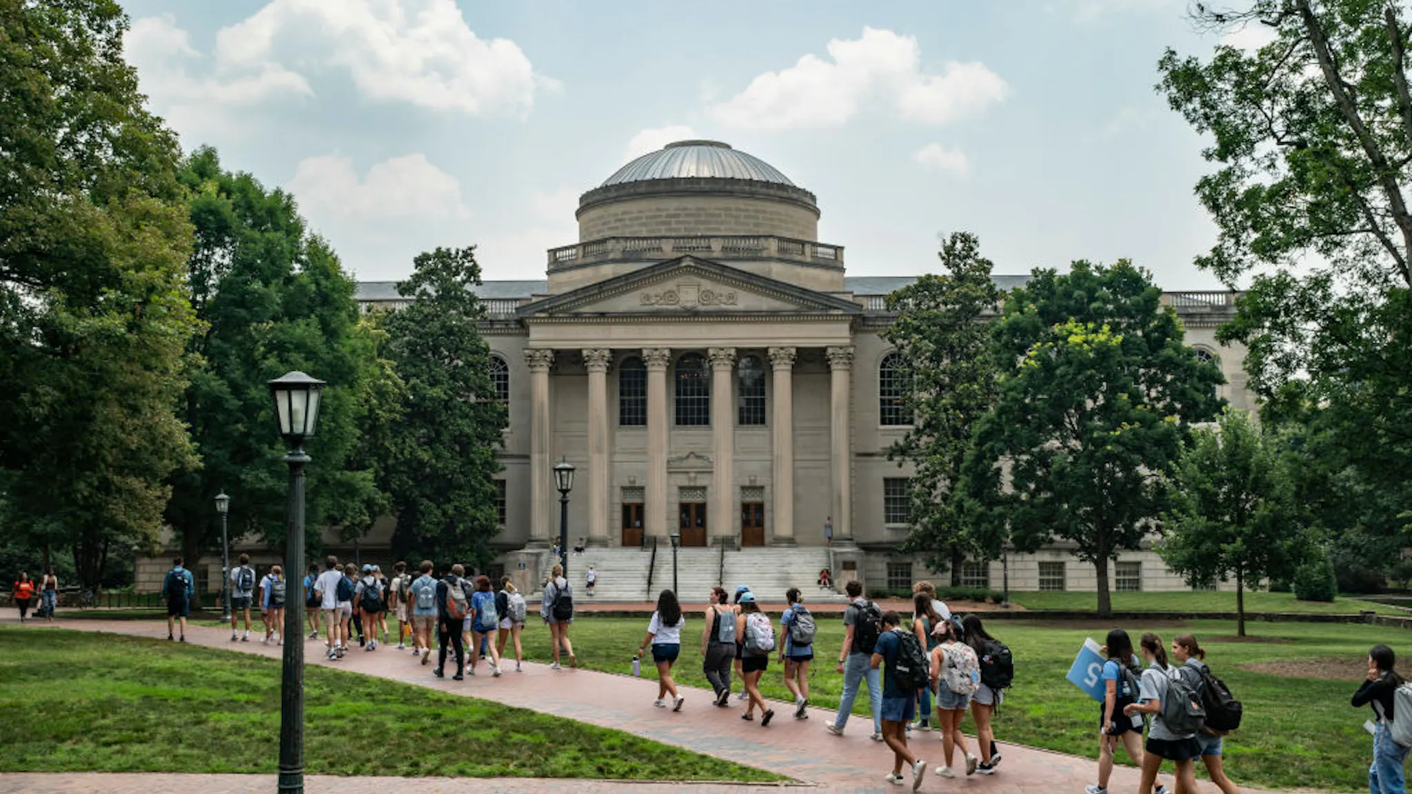 Supreme Court Rules Affirmative Action Is Unconstitutional In Landmark Case With Harvard And UNC CHAPEL HILL, NORTH CAROLINA - JUNE 29: People walk on the campus of the University of North Carolina Chapel Hill on June 29, 2023 in Chapel Hill, North Carolina. The U.S. Supreme Court ruled that race-conscious admission policies used by Harvard and the University of North Carolina violate the Constitution, bringing an end to affirmative action in higher education. (Photo by Eros Hoagland/Getty Images)
