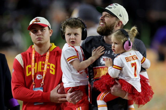 GLENDALE, ARIZONA - FEBRUARY 12: Harrison Butker #7 of the Kansas City Chiefs celebrates with his children after kicking the go ahead field goal to beat the Philadelphia Eagles in Super Bowl LVII at State Farm Stadium on February 12, 2023 in Glendale, Arizona. (Photo by Carmen Mandato/Getty Images)
