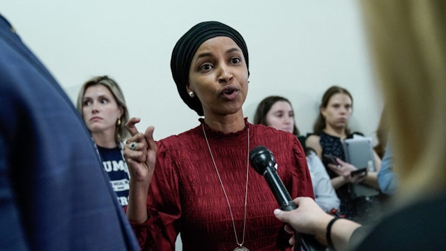 US Representative Ilhan Omar, Democrat of Minnesota, speaks to reporters in the hallway outside a House Committee on Education and the Workforce hearing "Columbia in Crisis: Columbia University's Response to Anti Semitism" at Capitol Hill in Washington, DC on April 17, 2024.