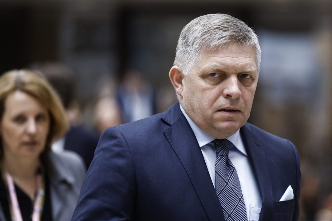 Slovakia's Prime Minister Robert Fico walks during the European Council summit at the EU headquarters in Brussels, on April 18, 2024.