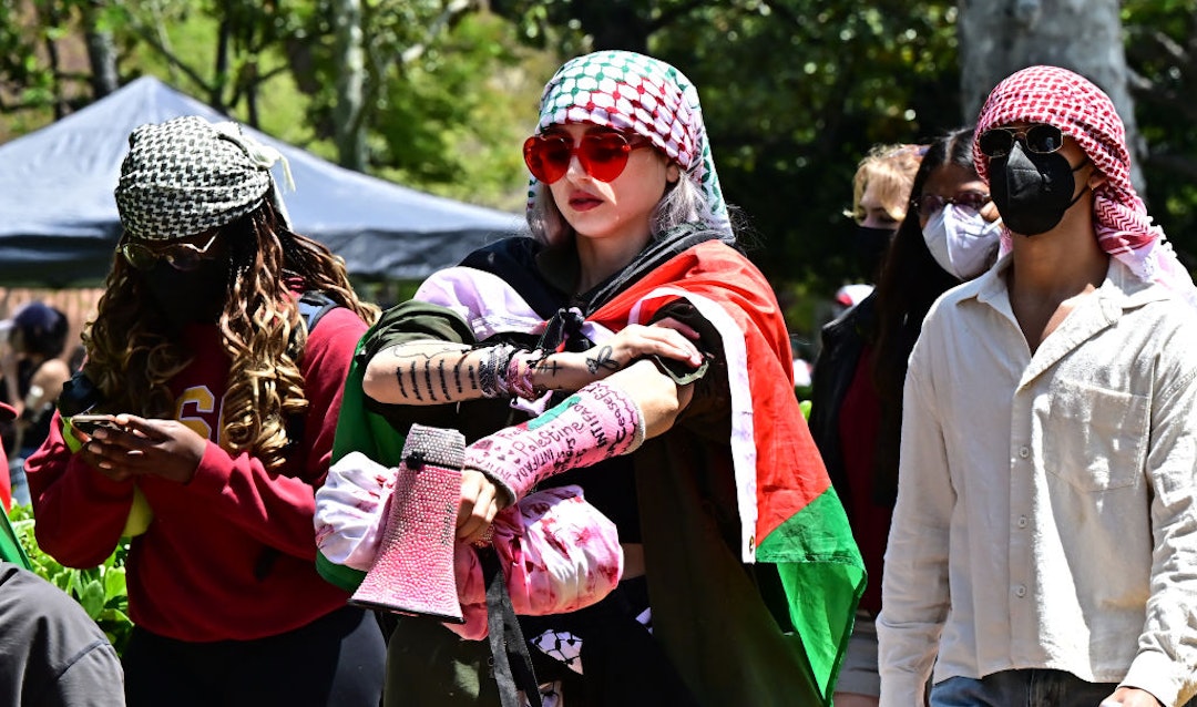 Students attend a pro-Palestinian rally against the Israel-Hamas war on the campus of the University of Southern California in Los Angeles, on April 24, 2024. Universities have become the focus of intense cultural debate in the United States since the October 7 Hamas attack and Israel's overwhelming military response to it. (Photo by Frederic J. BROWN / AFP) (Photo by FREDERIC J. BROWN/AFP via Getty Images)