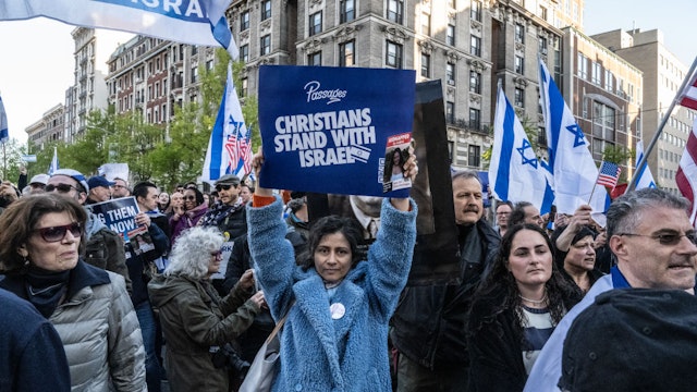 NEW YORK, NEW YORK - APRIL 25: Israel supporters, including Christian evangelicals, participate in the United for Israel march outside of Columbia University on April 25, 2024 in New York City. Israel supporters are reacting to the growing number of college campuses throughout the country whose student protesters are setting up pro-Palestinian tent encampments on school grounds. (Photo by Stephanie Keith/Getty Images)