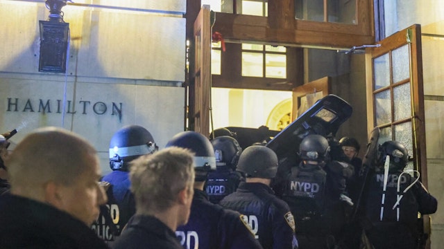NEW YORK, UNITED STATES - APRIL 30: New York Police Department officers detain dozens of pro-Palestinian students at Columbia University after they barricaded themselves at the Hamilton Hall building near Gaza Solidarity Encampment earlier in New York, United States on April 30, 2024.