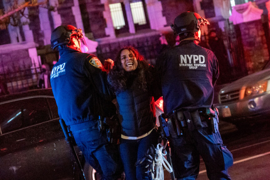 NEW YORK, NEW YORK - APRIL 30: Police arrest protesters during pro-Palestinian demonstrations at The City College Of New York (CUNY) as the NYPD cracks down on protest camps at both Columbia University and CCNY on April 30, 2024 in New York City. A heavy police presence surrounded both campuses on Tuesday as local law enforcement cleared tent encampments set up by pro-Palestinian protesters. Classes at both schools have been moved virtually to online learning in response to the recent campus unrest. (Photo by Spencer Platt/Getty Images)