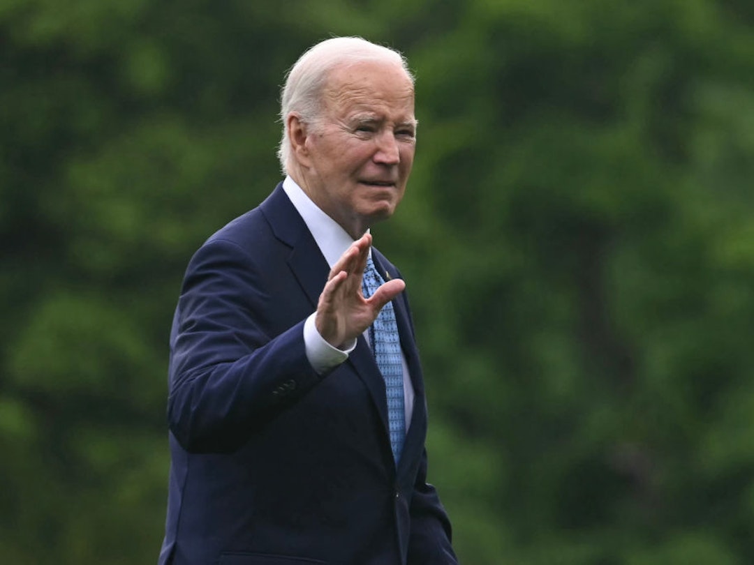 US President Joe Biden waves as he walks on the South Lawn of the White House after returning on Marine One, in Washington, DC, on May 6, 2024. Biden is returning from Wilmington where he spent the weekend. (Photo by ANDREW CABALLERO-REYNOLDS / AFP) (Photo by ANDREW CABALLERO-REYNOLDS/AFP via Getty Images)