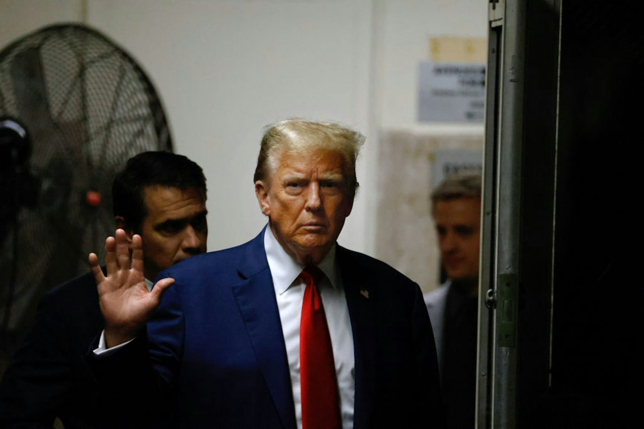 NEW YORK, NEW YORK - MAY 6: Former U.S. President Donald Trump gestures as he returns from a break in his trial for allegedly covering up hush money payments at Manhattan Criminal Court on May 6, 2024 in New York City. Trump was charged with 34 counts of falsifying business records last year, which prosecutors say was an effort to hide a potential sex scandal, both before and after the 2016 presidential election. Trump is the first former U.S. president to face trial on criminal charges.
