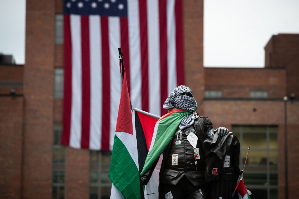 George Washington University Pro-Hamas Activists Project Flames Onto American Flag