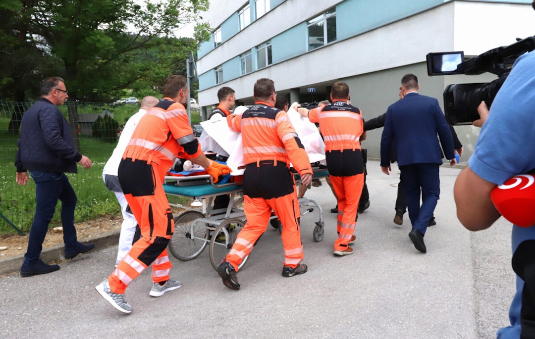 Picture taken on May 15, 2024 shows Slovak Prime Minister Robert Fico being transported by medics and his security detail to the hospital in Banska Bystrica, Slovakia where he is to be treated after he had been shot "multiple times"