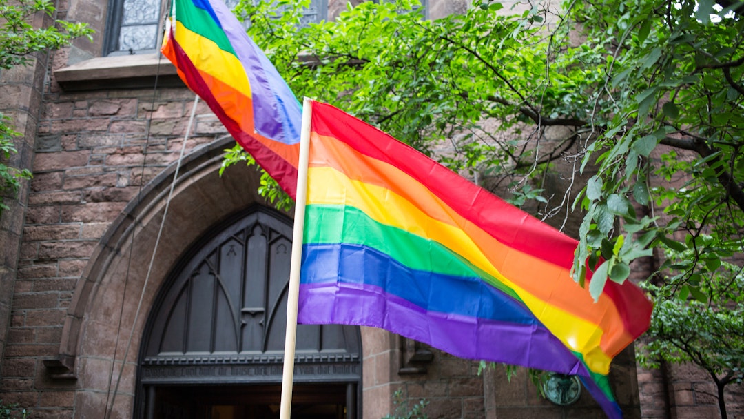 Rainbow flags proudly displayed at the church of ascention in manhattan on 5th avenue.