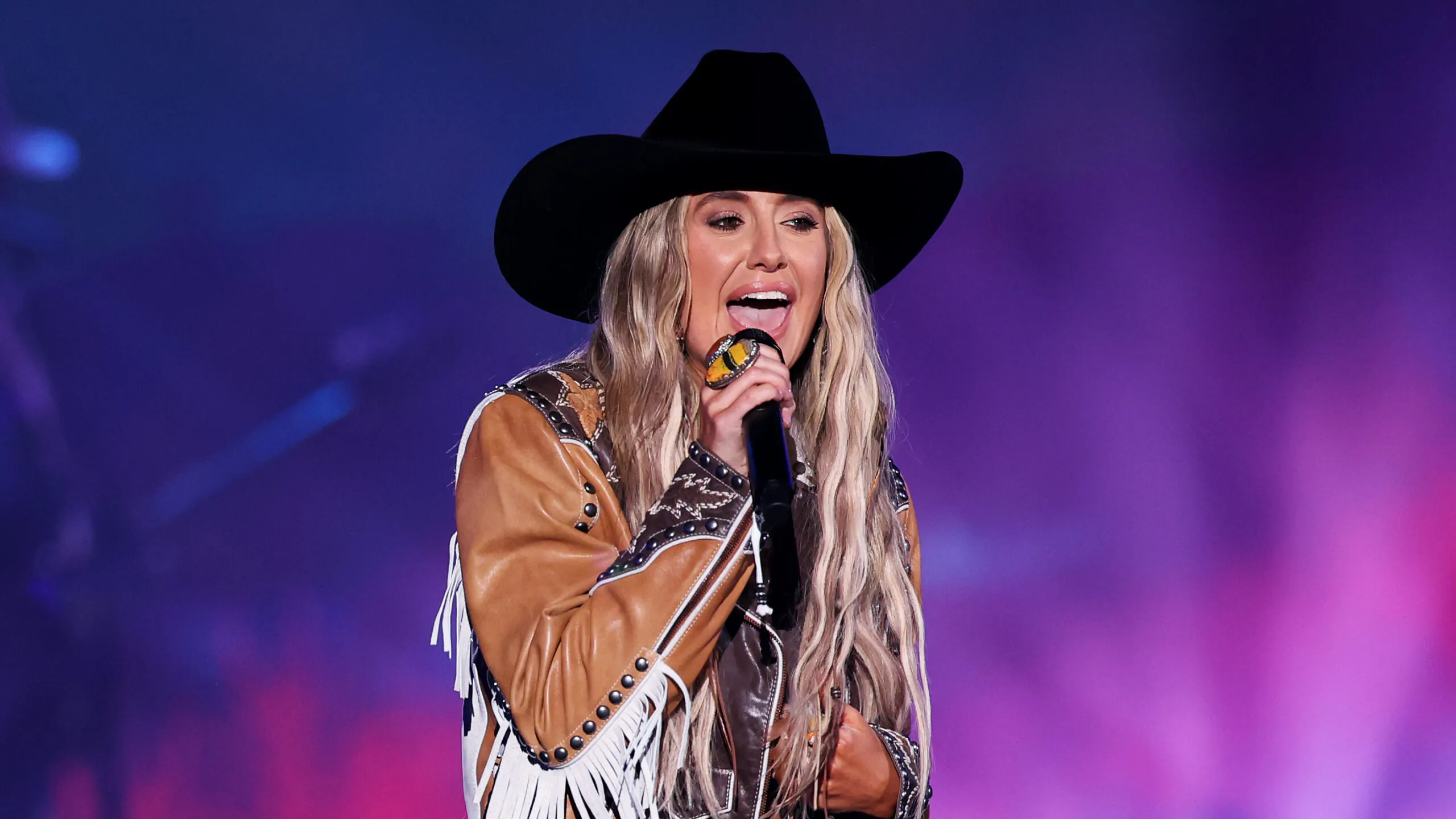 Country Star Lainey Wilson Says ‘Long Line Of Farmers’ Taught Her Work Ethic